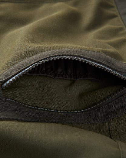 Willow Green Coloured Harkila Pro Hunter Move Trousers on white background #colour_willow-green