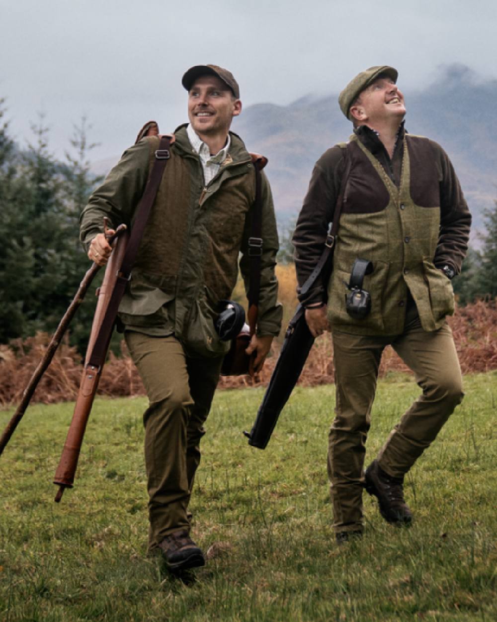 Willow Green Coloured Harkila Rannoch HWS Shooting Jacket on forest background #colour_willow-green