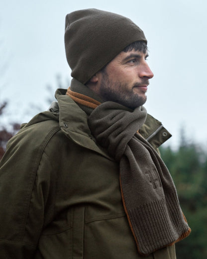 Shadow Brown Rustique Clay Coloured Harkila Reversible Beanie on outdoor background #colour_shadow-brown-rustique-clay