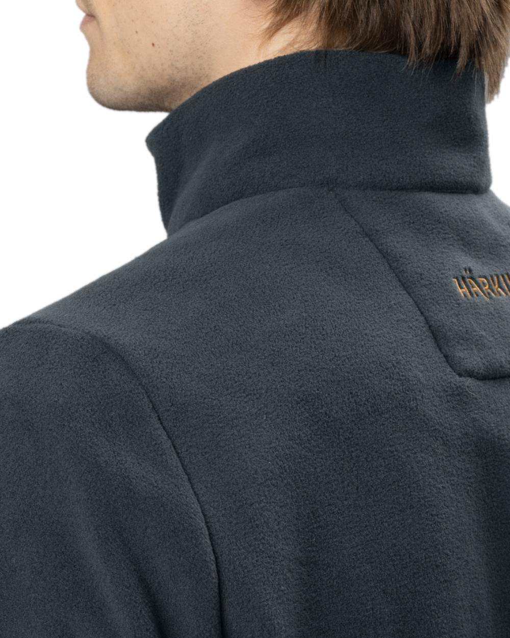 Dark Navy Coloured Harkila Sandhem 200 Fleece Pullover on white background #colour_dark-navy