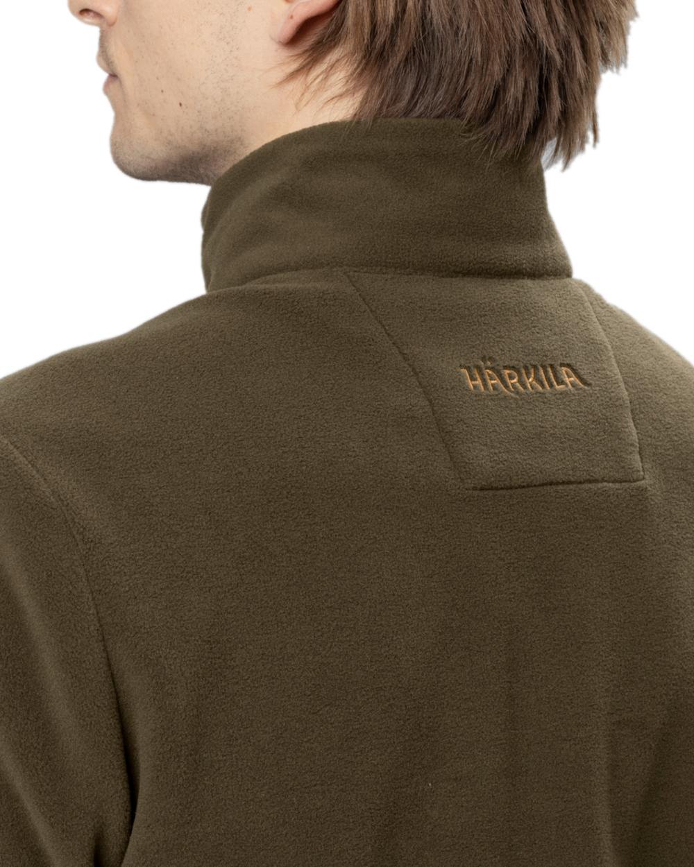 Willow Green Coloured Harkila Sandhem 200 Fleece Pullover on white background #colour_willow-green