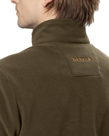 Willow Green Coloured Harkila Sandhem 200 Fleece Pullover on white background #colour_willow-green