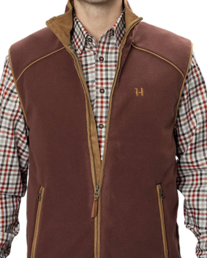 Burgundy Coloured Harkila Sandhem 200 Fleece Waistcoat on white background #colour_burgundy