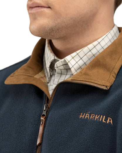 Dark Navy Melange Coloured Harkila Sandhem Fleece Pullover on white background #colour_dark-navy-melange