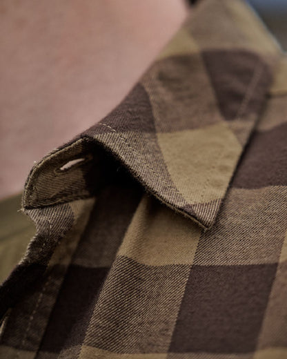 Antique Bronze Check Coloured Harkila Scandinavian Long Sleeve Shirt on blurry background #colour_antique-bronze-check