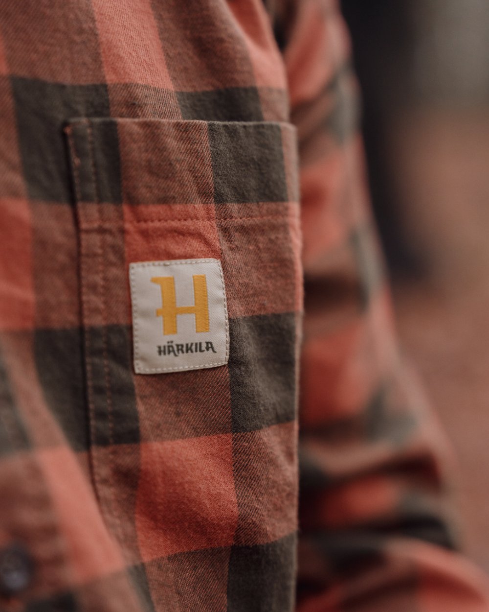 Autumn Orange Check coloured Harkila Scandinavian Long Sleeve Shirt on outdoor background #colour_autumn-orange-check