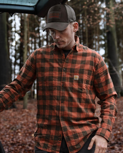 Autumn Orange Check coloured Harkila Scandinavian Long Sleeve Shirt on outdoor background #colour_autumn-orange-check