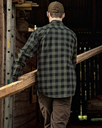 Green Check Coloured Harkila Scandinavian Long Sleeve Shirt on countryside background #colour_green-check