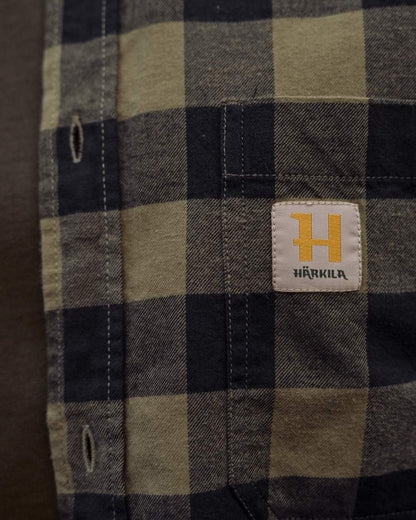 Tarmac Check coloured Harkila Scandinavian Long Sleeve Shirt on outdoor background #colour_tarmac-check