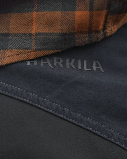Salute Anthracite Coloured Harkila Scandinavian Trousers on forest background #colour_salute-anthracite