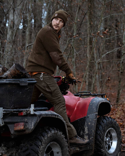 Shadow Brown Deep Brown coloured Harkila Scandinavian Trousers on woodland background #colour_shadow-brown-dark-brown