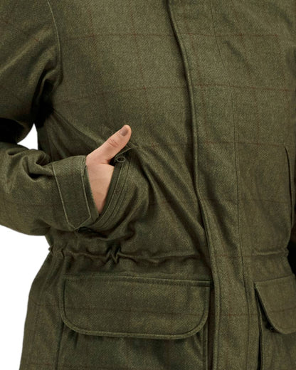 Willow Green Coloured Harkila Stornoway Shooting Lady Jacket on white background #colour_willow-green