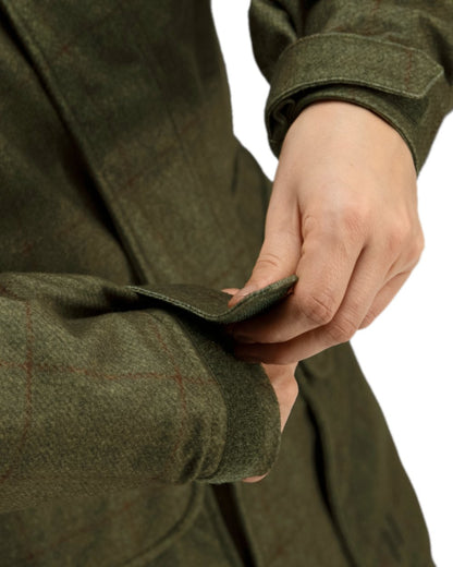 Willow Green Coloured Harkila Stornoway Shooting Lady Jacket on white background #colour_willow-green