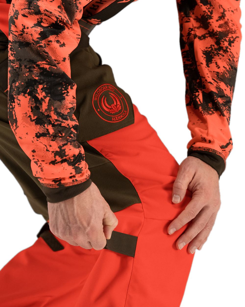 Wildboar Orange Willow Green Coloured Harkila Wildboar Pro Trousers on white background #colour_wildboar-orange-willow-green