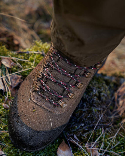Mid Brown Coloured Harkila Wildwood 2.0 GTX Womens Waterproof Boots on outdoor background #colour_mid-brown