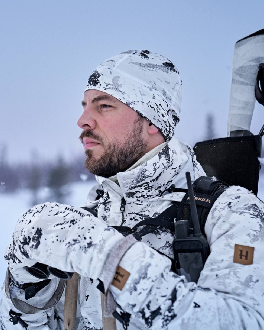 AXIS Snow Coloured Harkila Winter Active Beanie on snow background #colour_axis-snow