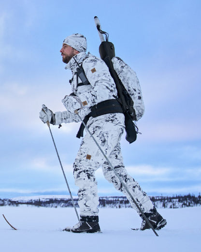 AXIS Snow Coloured Harkila Winter Active WSP Jacket on snow background #colour_axis-snow