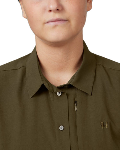 Willow Green Coloured Harkila Women's Trail L/S Shirt on white background #colour_willow-green