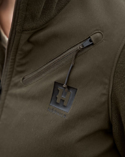 Hunting Green Willow Green Coloured Harkila Womens Fjell Fleece Jacket on blurry background #colour_hunting-green-willow-green