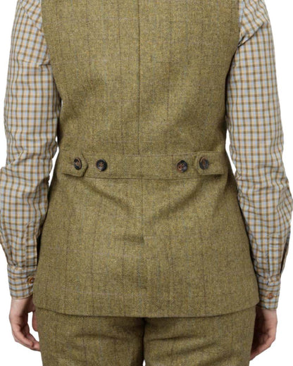 Olive Coloured Harkila Womens Jura Shooting Waistcoat on white background #colour_olive