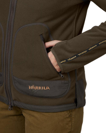 Brown Red Coloured Harkila Womens Kamko Reversible Windstopper Fleece Jacket on white background #colour_brown-red