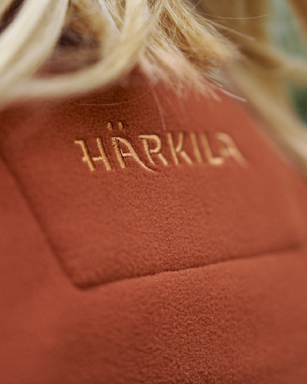 Dark Olive Arabian Spice Coloured Harkila Womens Kamko Reversible Windstopper Fleece Jacket on outdoor background #colour_dark-olive-arabian-spice
