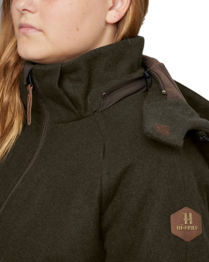 Willow Green Coloured Harkila Womens Metso Winter Jacket on white background #colour_willow-green