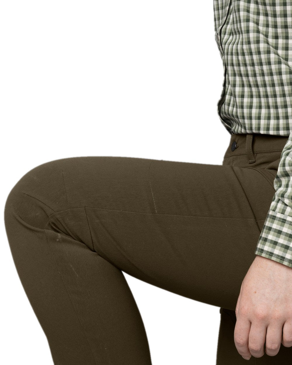 Dark Warm Olive Coloured Harkila Womens Retrieve Light Trousers on white background #colour_dark-warm-olive