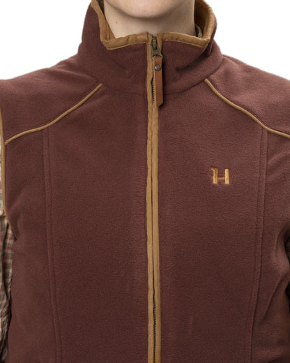 Burgundy Coloured Harkila Womens Sandhem 200 Fleece Waistcoat on white background #colour_burgundy