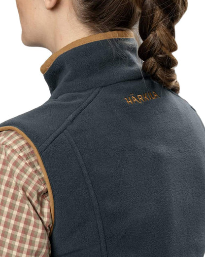 Dark Navy Coloured Harkila Womens Sandhem 200 Fleece Waistcoat on white background #colour_dark-navy