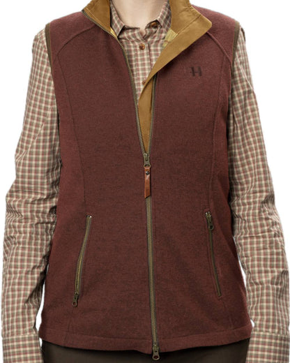 Dark Copper Coloured Harkila Womens Sandhem Pro Waistcoat on white background #colour_dark-copper