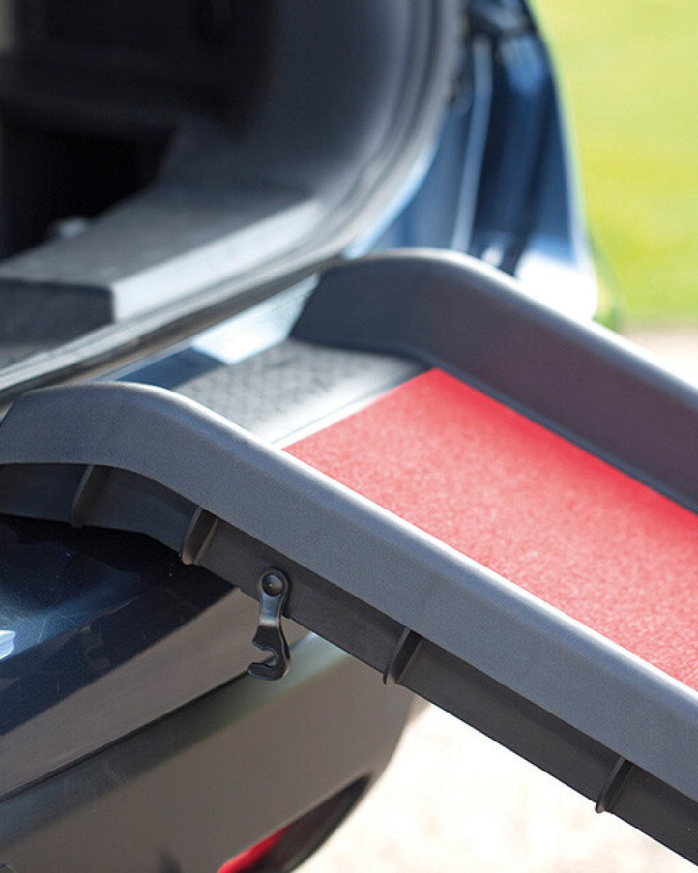 Black Red coloured Henry Wag Lightweight Folding Pet Ramp on car background #colour_black-red