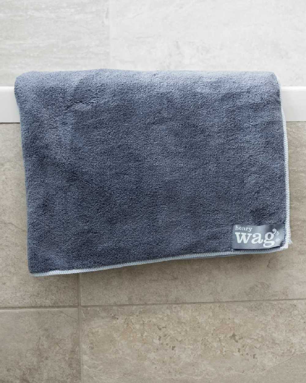 Grey Black coloured Henry Wag Microfibre Towel on house background #colour_grey-black