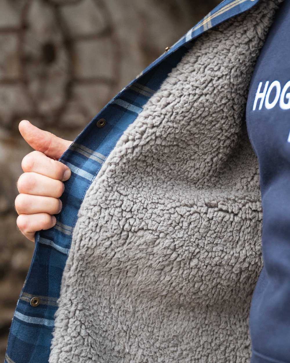 Navy Gold Coloured Hoggs of Fife Brunton Fleece Shacket on indoor background #colour_navy-gold