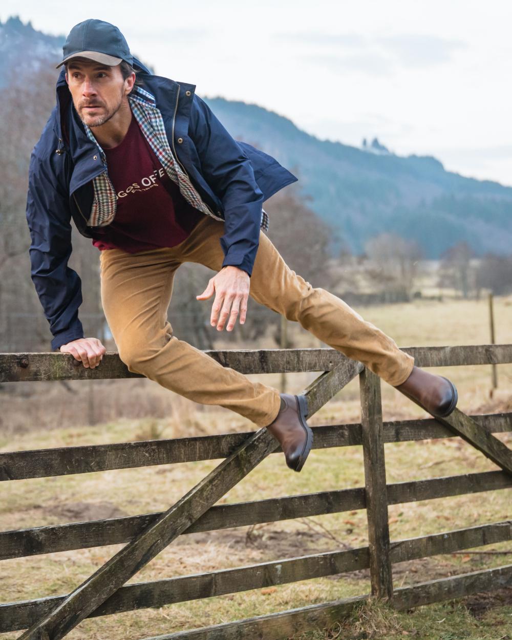 Harvest Coloured Hoggs of Fife Cairnie Comfort Stretch Cord Trousers on mountain background #colour_harvest