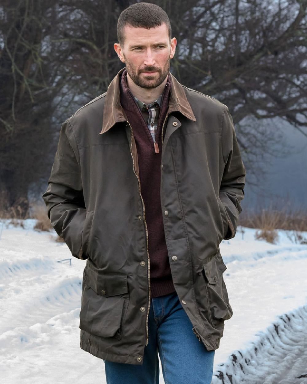 Olive Coloured Hoggs of Fife Caledonia Waxed Jacket on snow background #colour_olive
