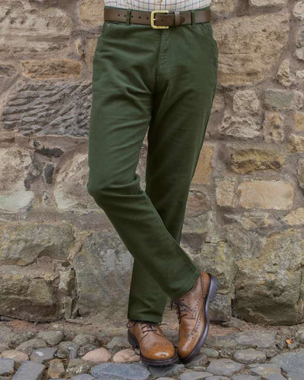 Dark Olive Coloured Hoggs of Fife Carrick Stretch Technical Moleskin Trousers on wall background #colour_dark-olive