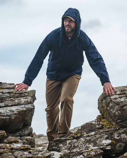 Dried Moss Coloured Hoggs of Fife Carrick Technical Stretch Moleskin Jeans on sky background #colour_dried-moss