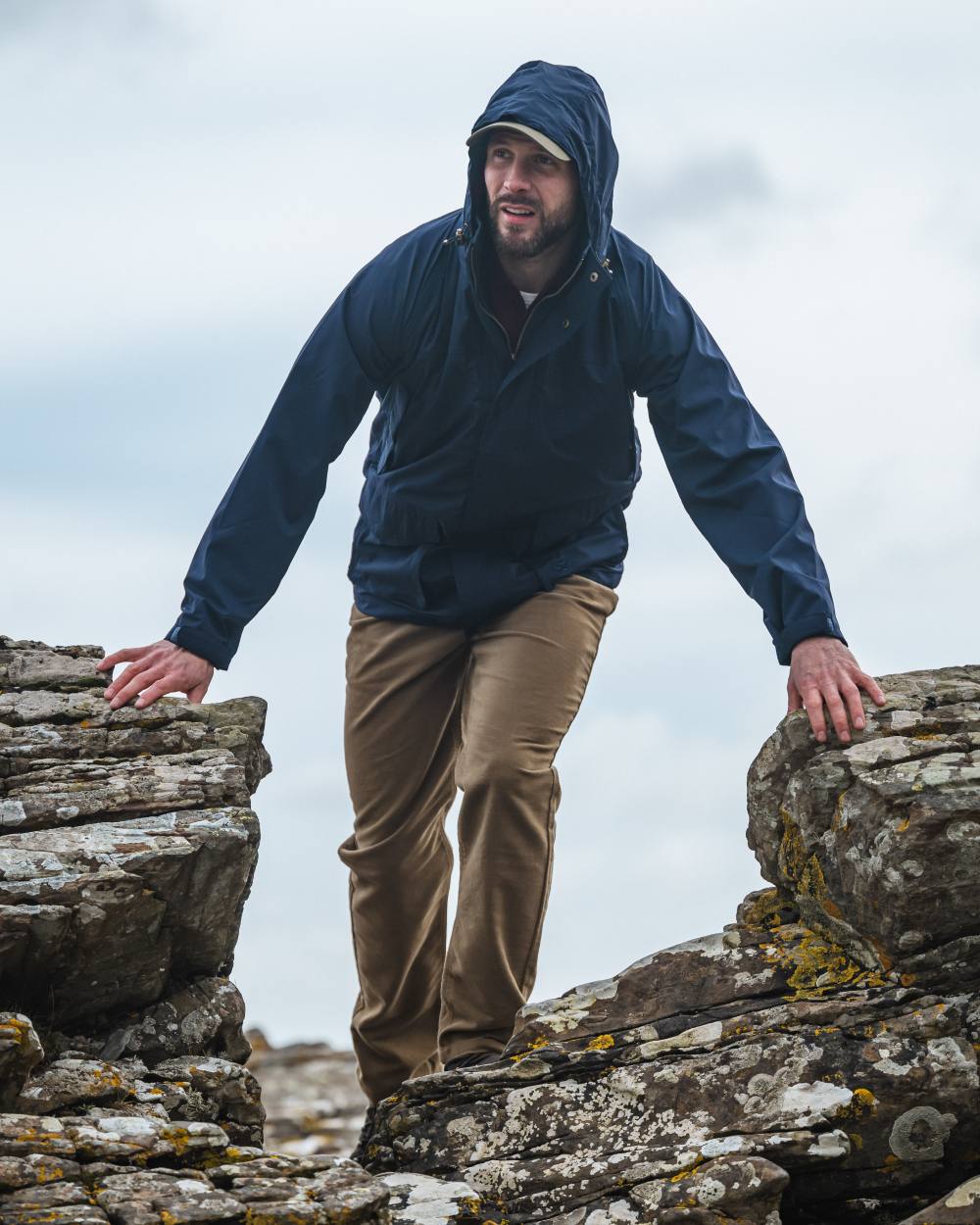 Navy Coloured Hoggs of Fife Culloden Waterproof Field Jacket on sky background #colour_navy