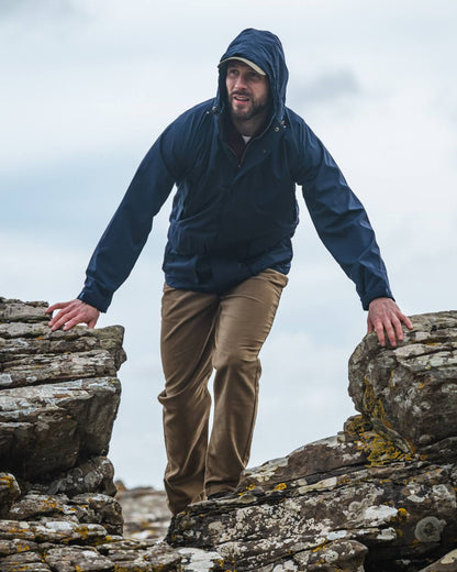 Navy Coloured Hoggs of Fife Culloden Waterproof Field Jacket on sky background #colour_navy