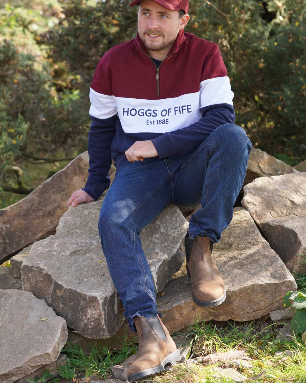 Burgundy White Navy Coloured Hoggs of Fife Dumfries 1888 Mens Quarter Zip Sweatshirt on farm background #colour_burgundy-white-navy