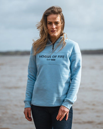 Plain Blue Coloured Hoggs of Fife Dumfries 1888 Womens Quarter Zip Sweatshirt on sea background #colour_plain-blue