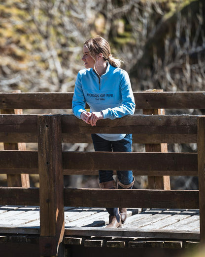 Plain Blue Coloured Hoggs of Fife Dumfries 1888 Womens Quarter Zip Sweatshirt on bridge background #colour_plain-blue