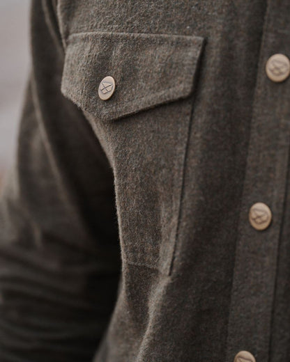 Loden Marl Coloured Hoggs of Fife Dunvegan Flannel Shirt on blurry background #colour_loden-marl