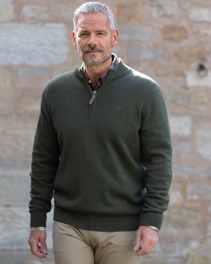 Fern Green coloured Hoggs of Fife Falkirk Quarter Zip Pullover on wall background #colour_fern-green
