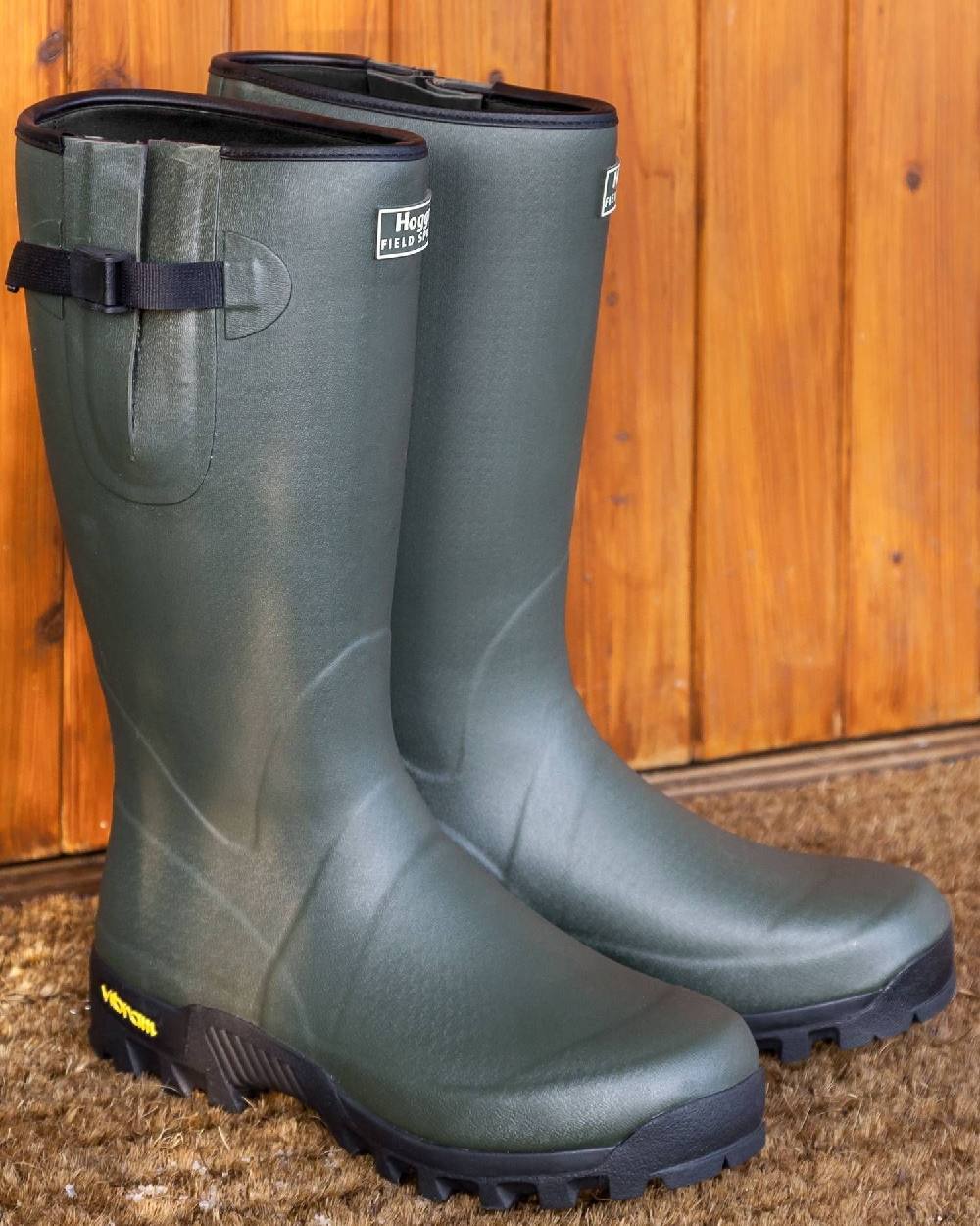 Field Green Coloured Hoggs of Fife Field Sport 365 Wellingtons on wood background #colour_field-green