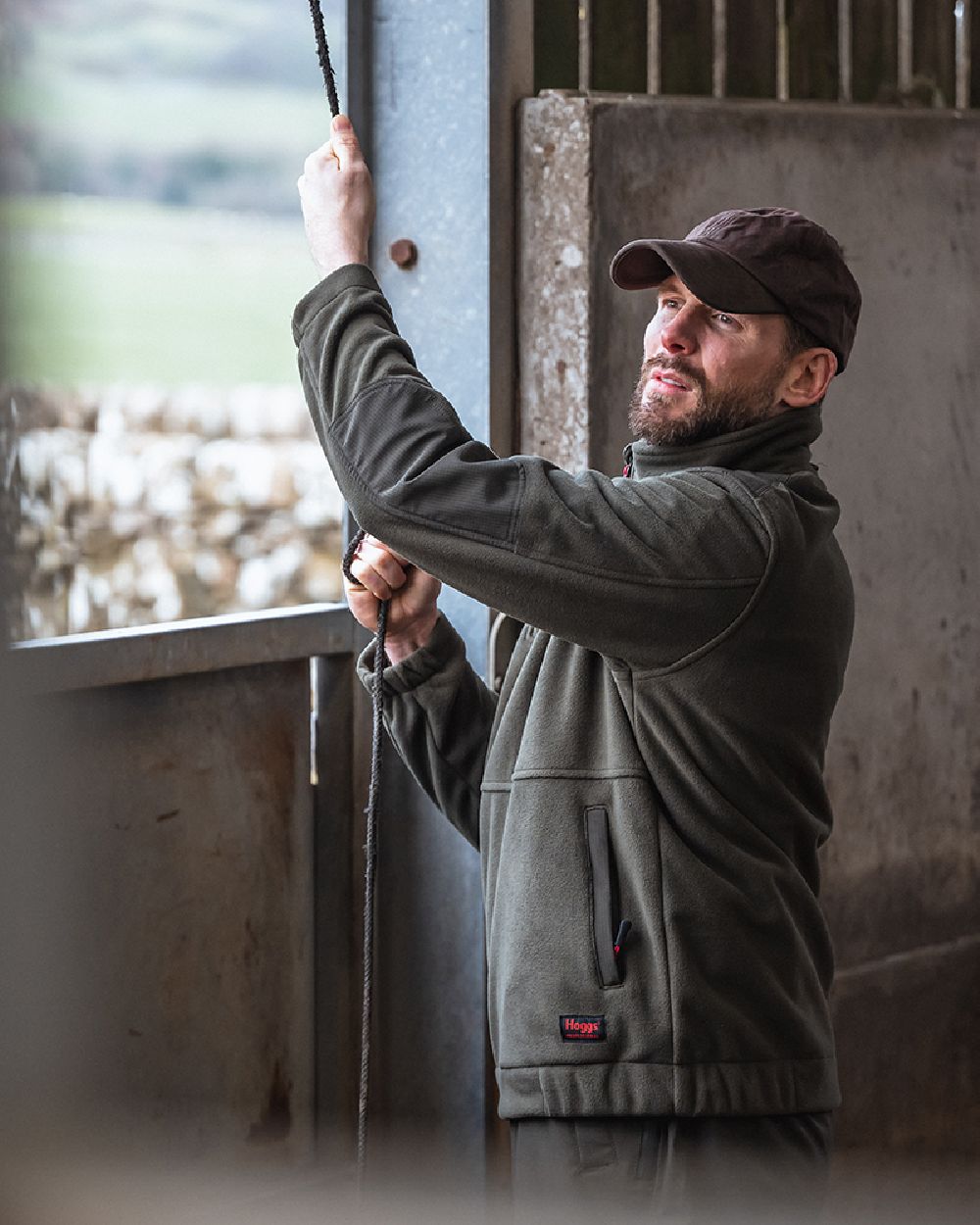 Green Coloured Hoggs of Fife Green King II 1/4 Zip Bonded Fleece on window background #colour_green