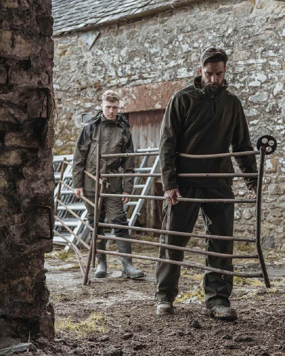 Green Coloured Hoggs of Fife Green King II 1/4 Zip Bonded Fleece on house background #colour_green