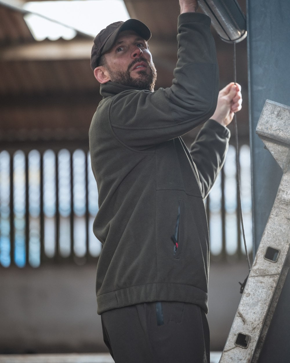 Green Coloured Hoggs of Fife Green King II 1/4 Zip Bonded Fleece on room background #colour_green
