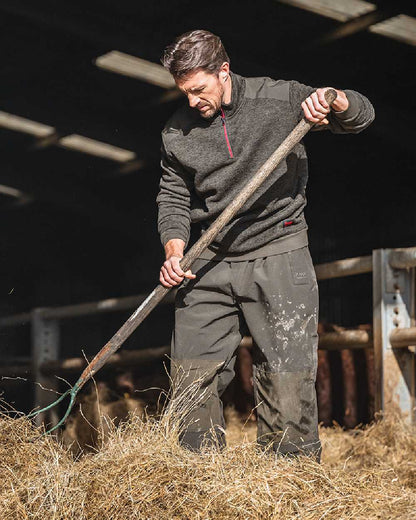 Green Coloured Hoggs of Fife Green King II Quarter Zip Knit Fleece on barn background #colour_green